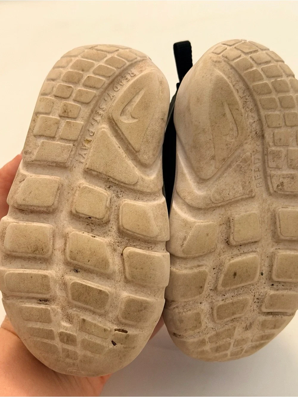 Nike Toddler Black and White Slip-On Sneakers